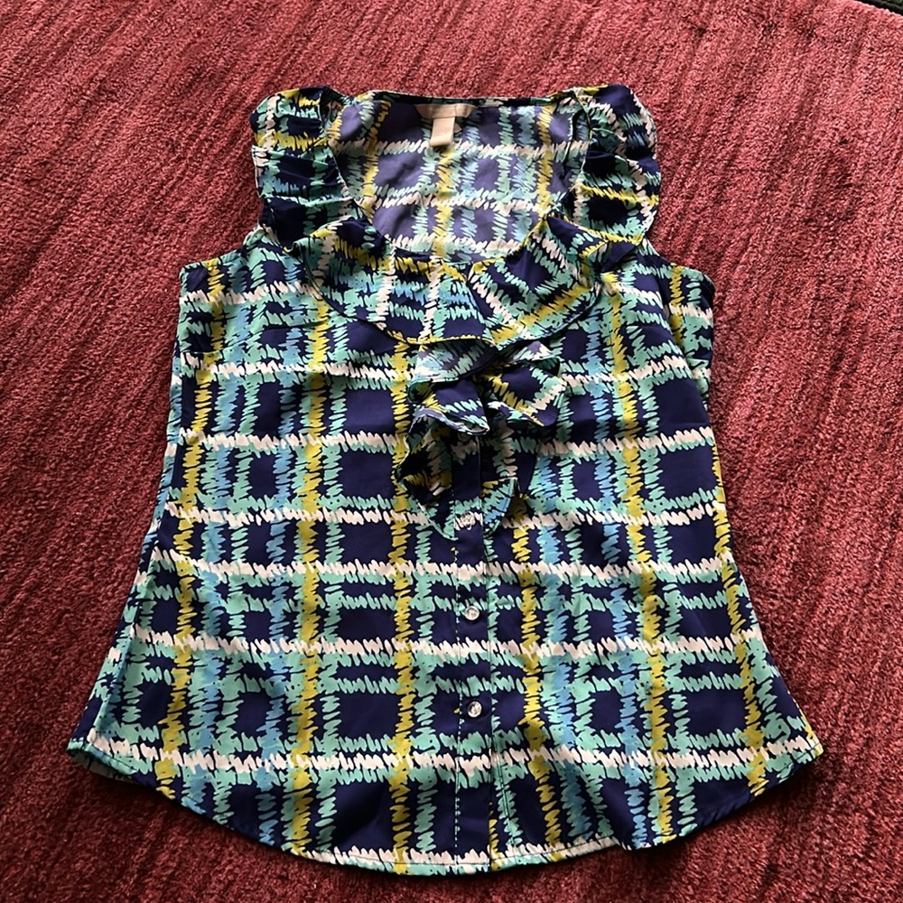 Ruffled sleeveless dressy top